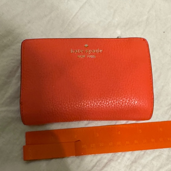 kate spade Handbags - Kate Spade Coral Leather Wallet